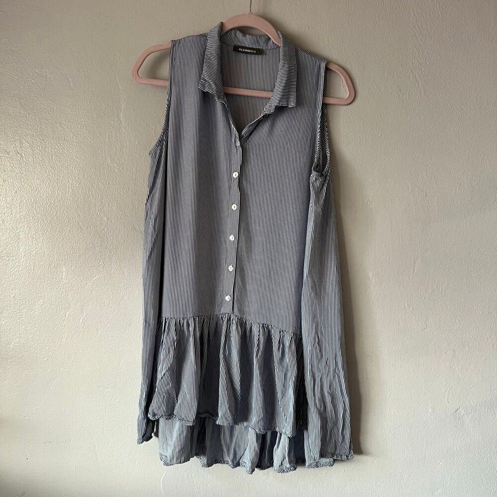 Alembika striped sleeveless button-down tunic featuring a collared tiered, ruffl